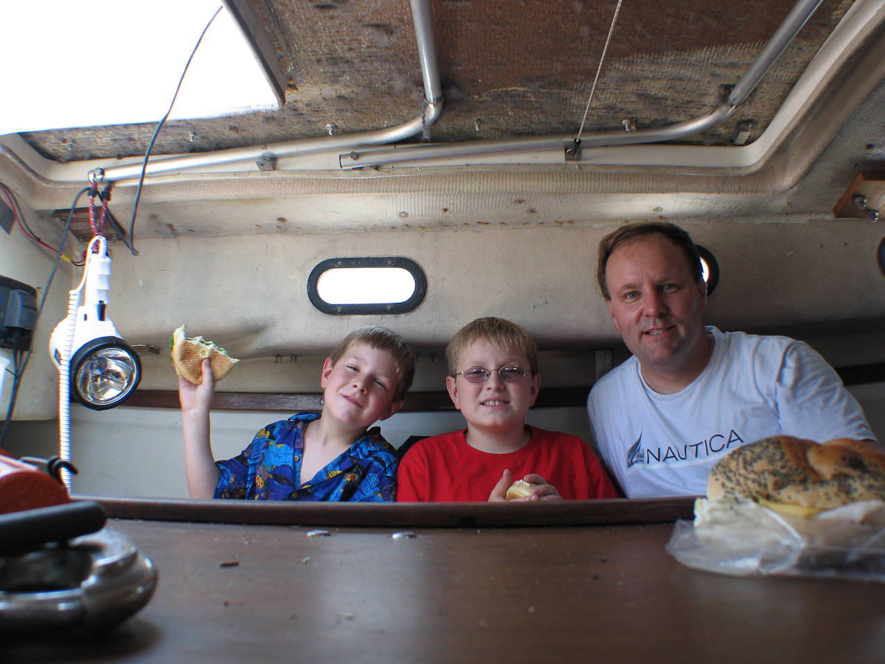   ~~  But mainsheet pulled over the masthead and we had to withdraw.....went back and had lunch in the harbor....drove to the party.