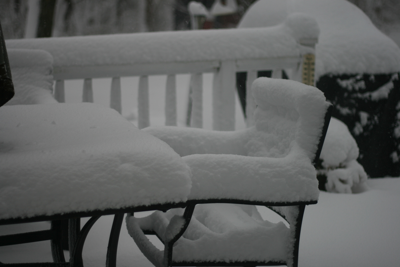 snow stacks on the furniture  ~~  