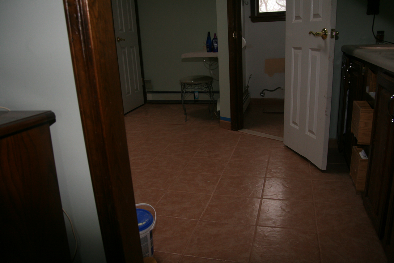 Floor done!  ~~  opens the room up!