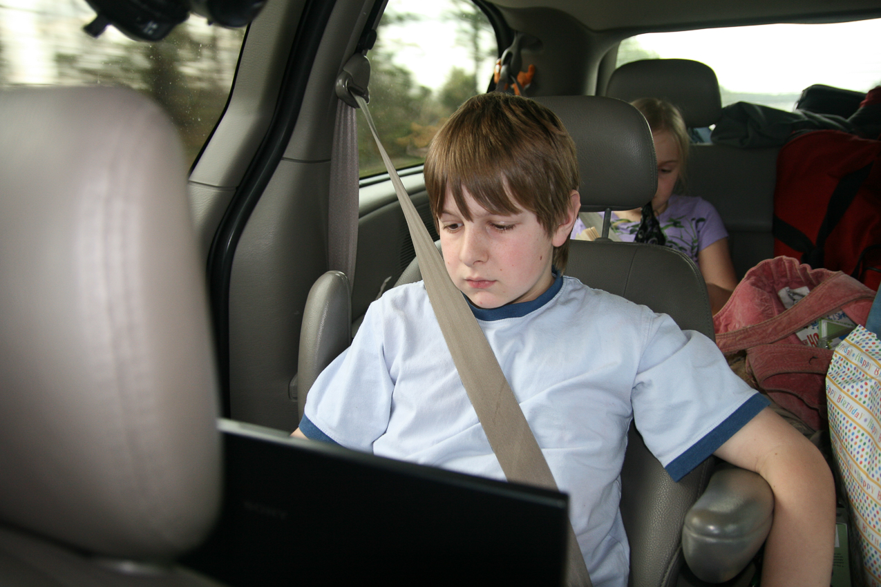 Quinn plays on the computer  ~~  got the inverter running, all the outlets are in use, we get about 10 miles to the gallon