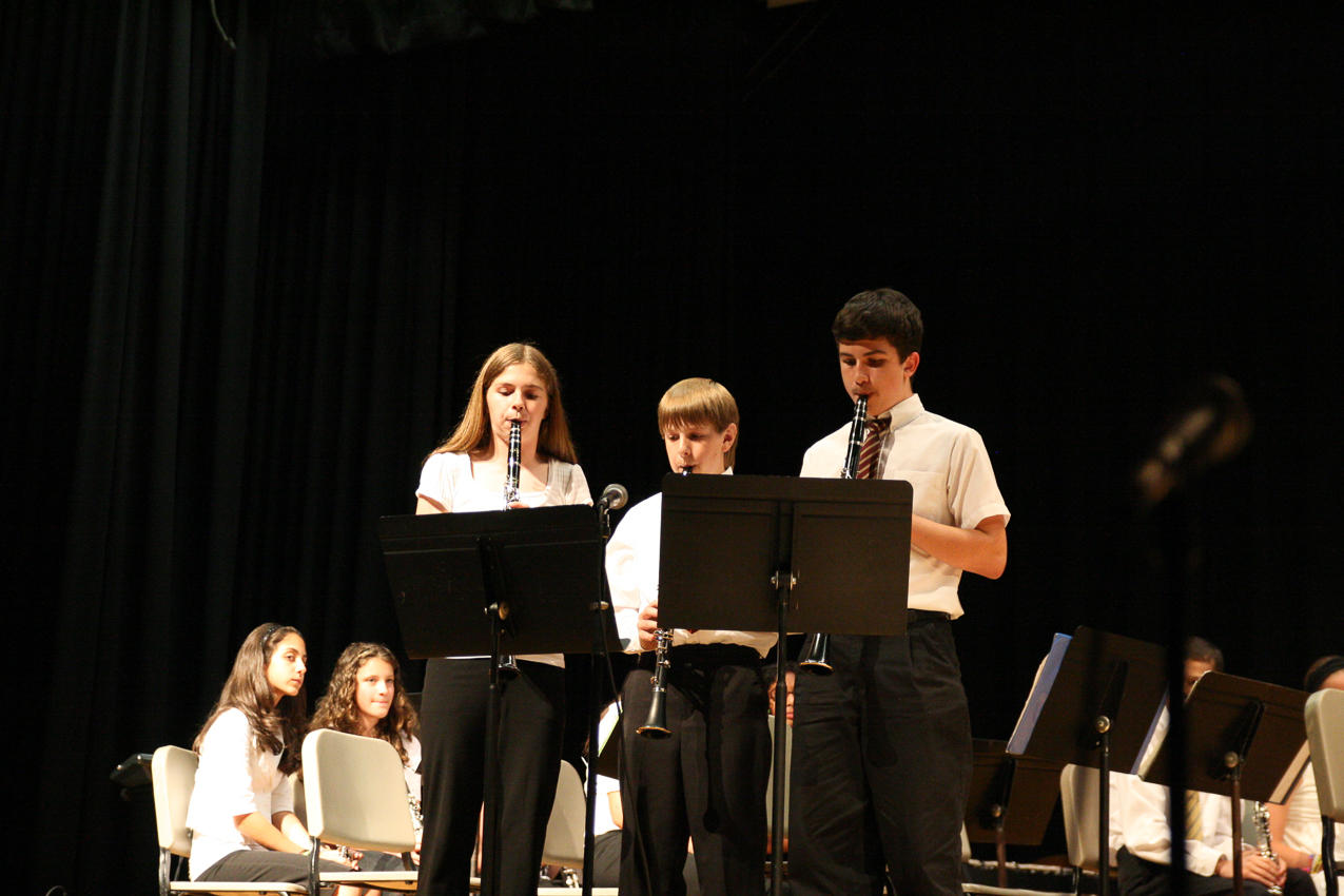 Quinn is second chair and did a solo for the school  ~~  