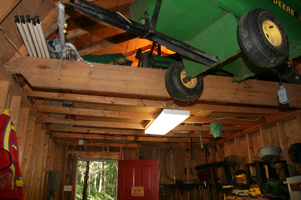 Put the 1/4 ton winch in the ceiling  ~~  to clear out the floor area like a real carriage house.  Snowthrower, bruch/leave sweeper, and trailer