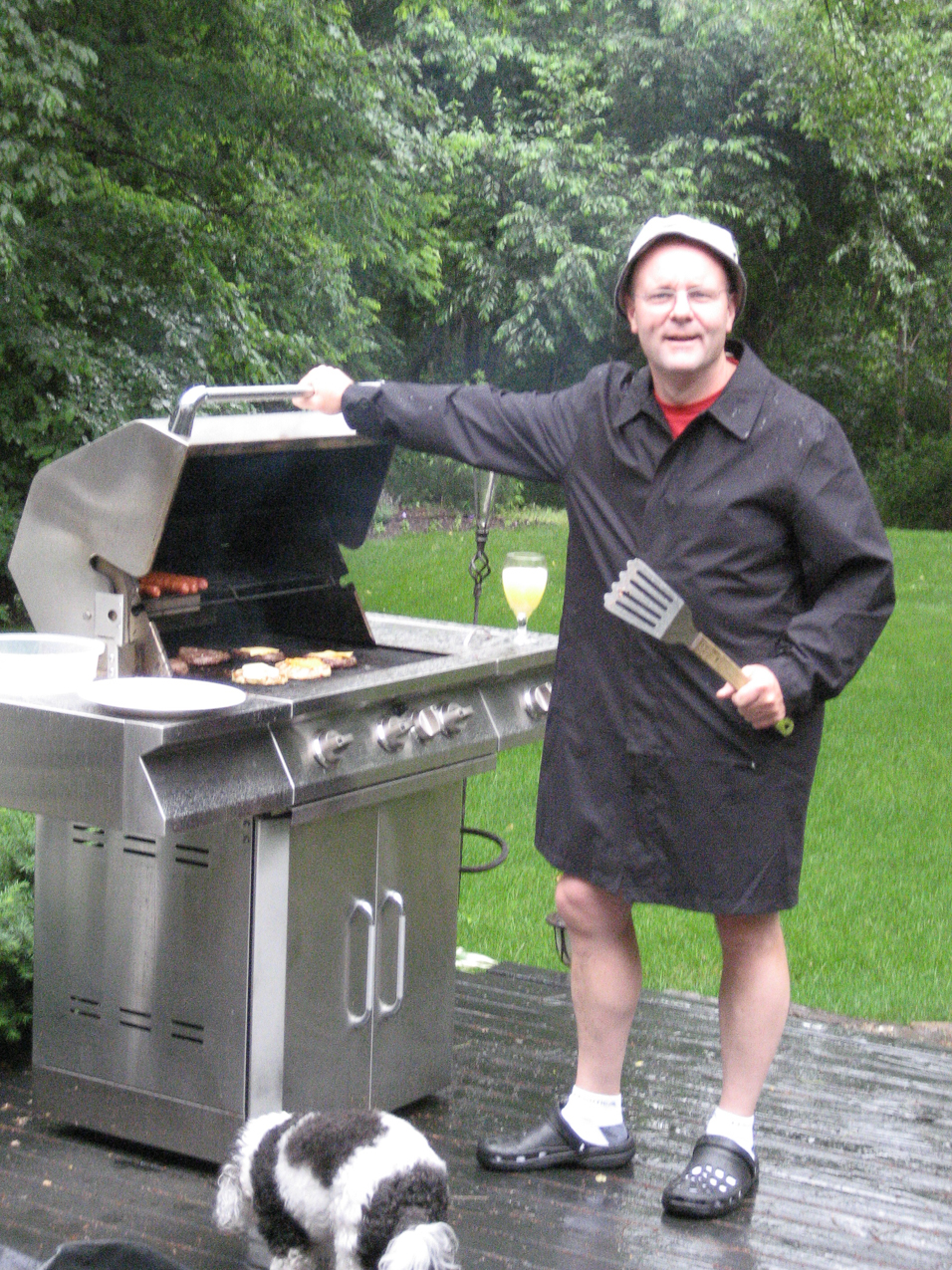 Most people don't BBQ in the rain?    ~~  Nice outfit!