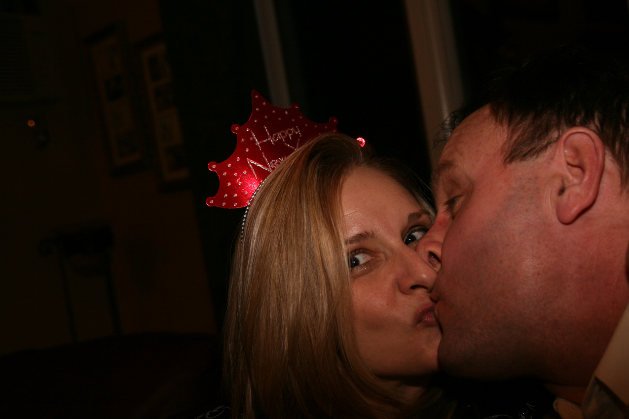 First smooch of the year!  ~~  Gret and I met 27 years ago almost at this moment at Elk Mountain, PA.  I proposed on the same place 7 years later.
