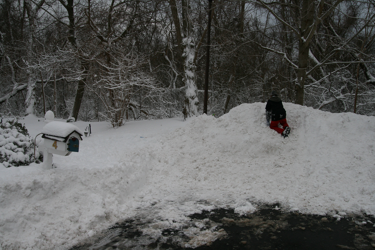 Nice plow job?!  ~~  back by that light pole is the right side of my driveway?