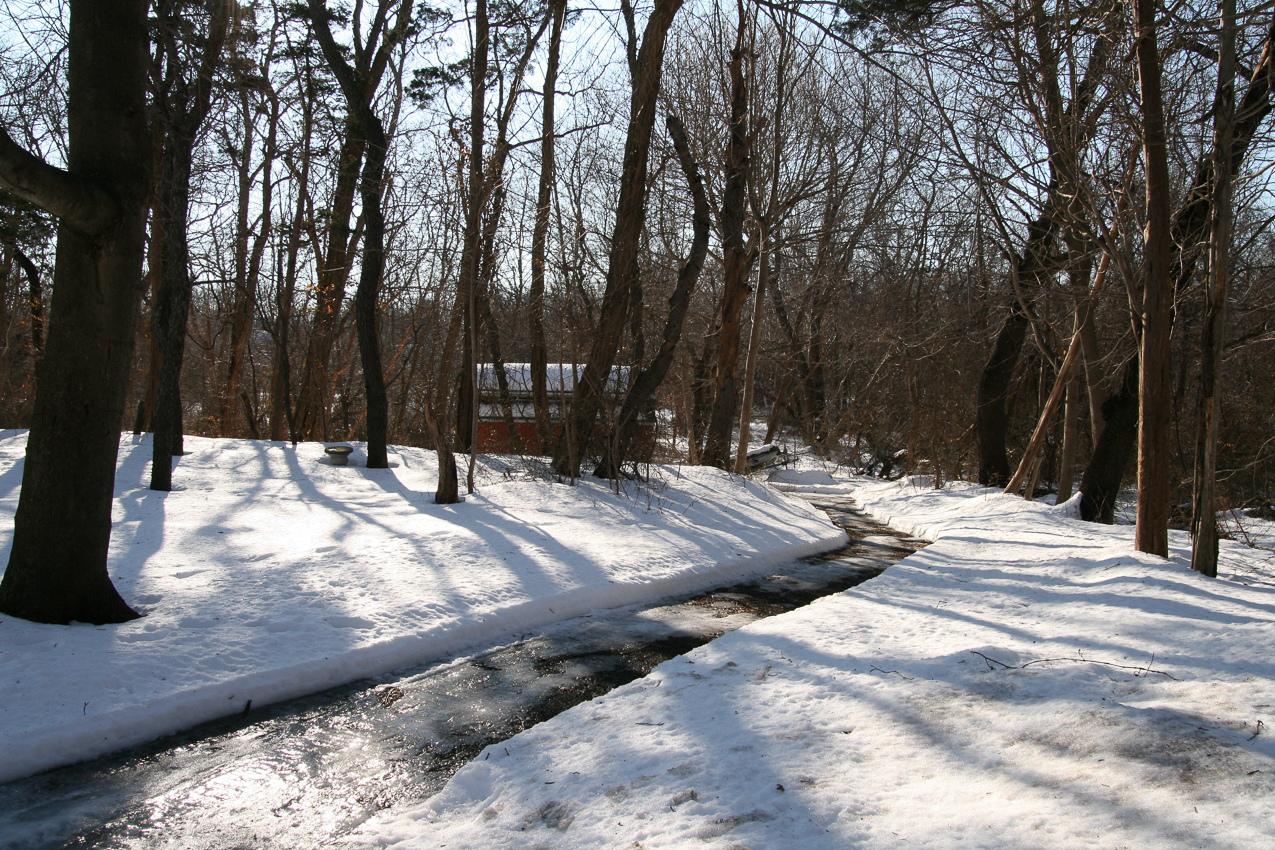 The dink sits back by the barn ........  ~~  waiting for a melt off and warmer temps to someday come.