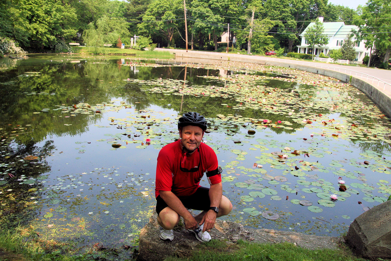 biking with my babe at the Duck Pond down the street  ~~  The 4 goldfish/koi i dumped in here 2 years ago have spawned thousands of babies.  (shhhhhh)