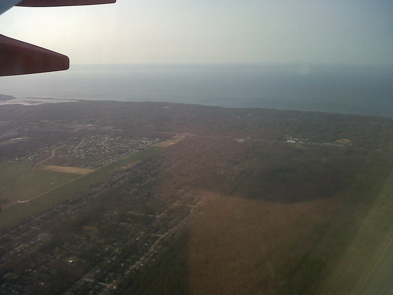 Look boss the house?  there it is?  Mt. Sinai harbor to the left.  ~~  flying back from Sales Kick off.   Ben a few yars since i took shots from a plane.....