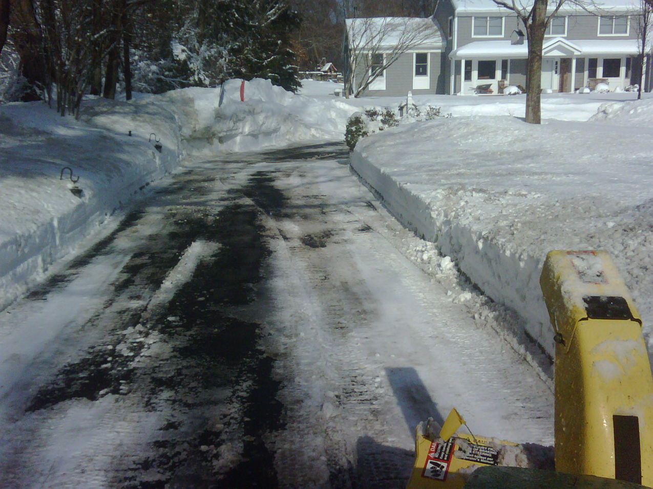 solid foot plus  ~~  still have the 5 foot high mound in front of my driveway from the last storm.