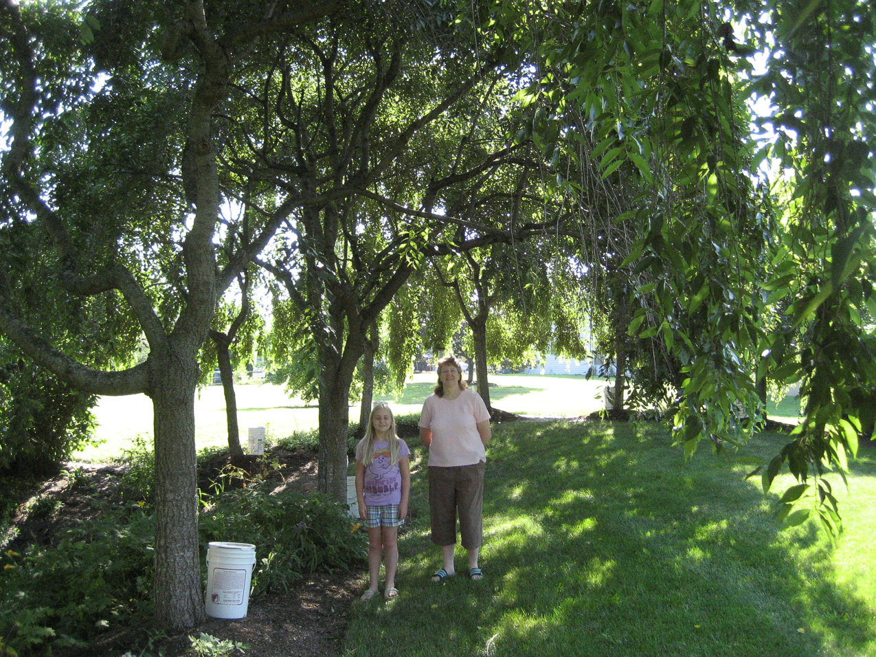 Mary and Sandy in her backyard  ~~  