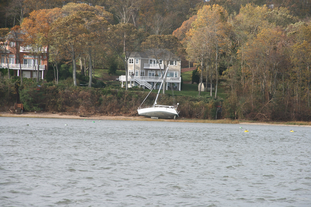 Hurricane Sandy come to town Nov 2012  ~~  a few boats went down harbor (about 10)