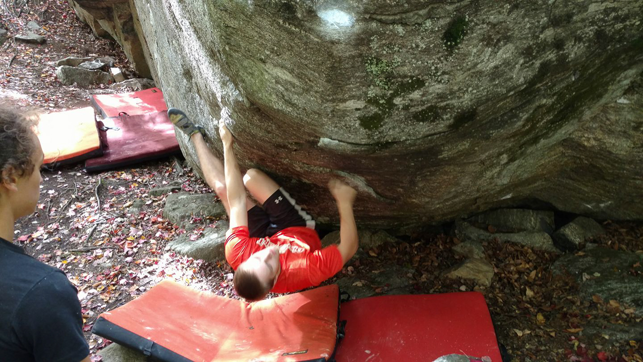 Daniel climbing cliff  ~~  Stolen from Facebook from one of his friends its the only way we know what he is up to??
