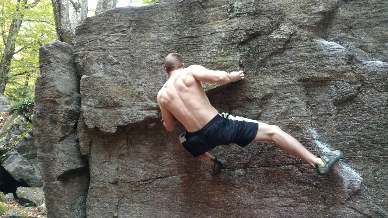 Daniel climbing cliff  ~~  Stolen from Facebook from one of his friends its the only way we know what he is up to??
