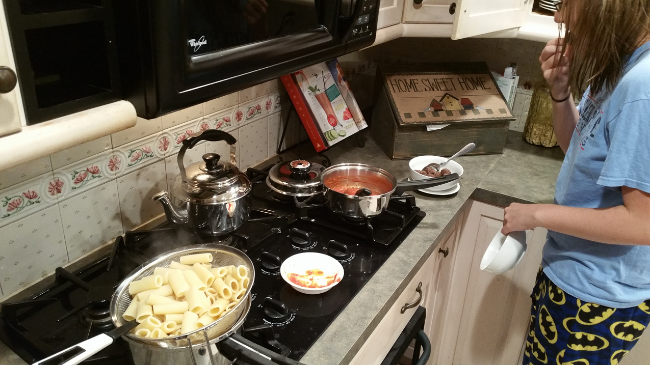 Making dinner for the Mary Moo.  ~~  nobody died and nobody starved while the Dad was cookin it up.  He is the ONE PAN WIZARD in the kitchen.