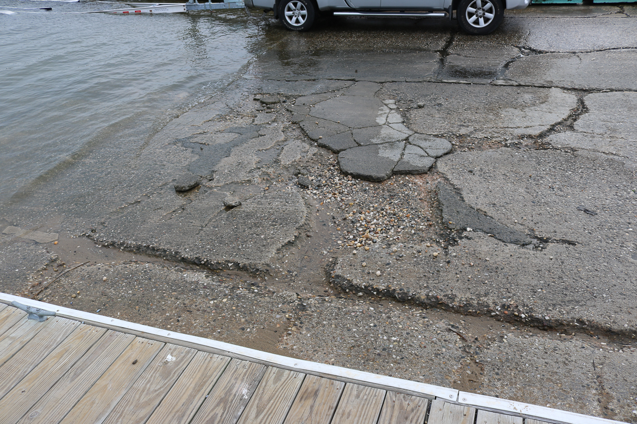 Town of Brookhaven Mt Sinai Harbor - years of disrepair actually getting worse.  ~~  Even WORSE in the last two weeks - I did not think possible.  More pieces and deeper ruts.