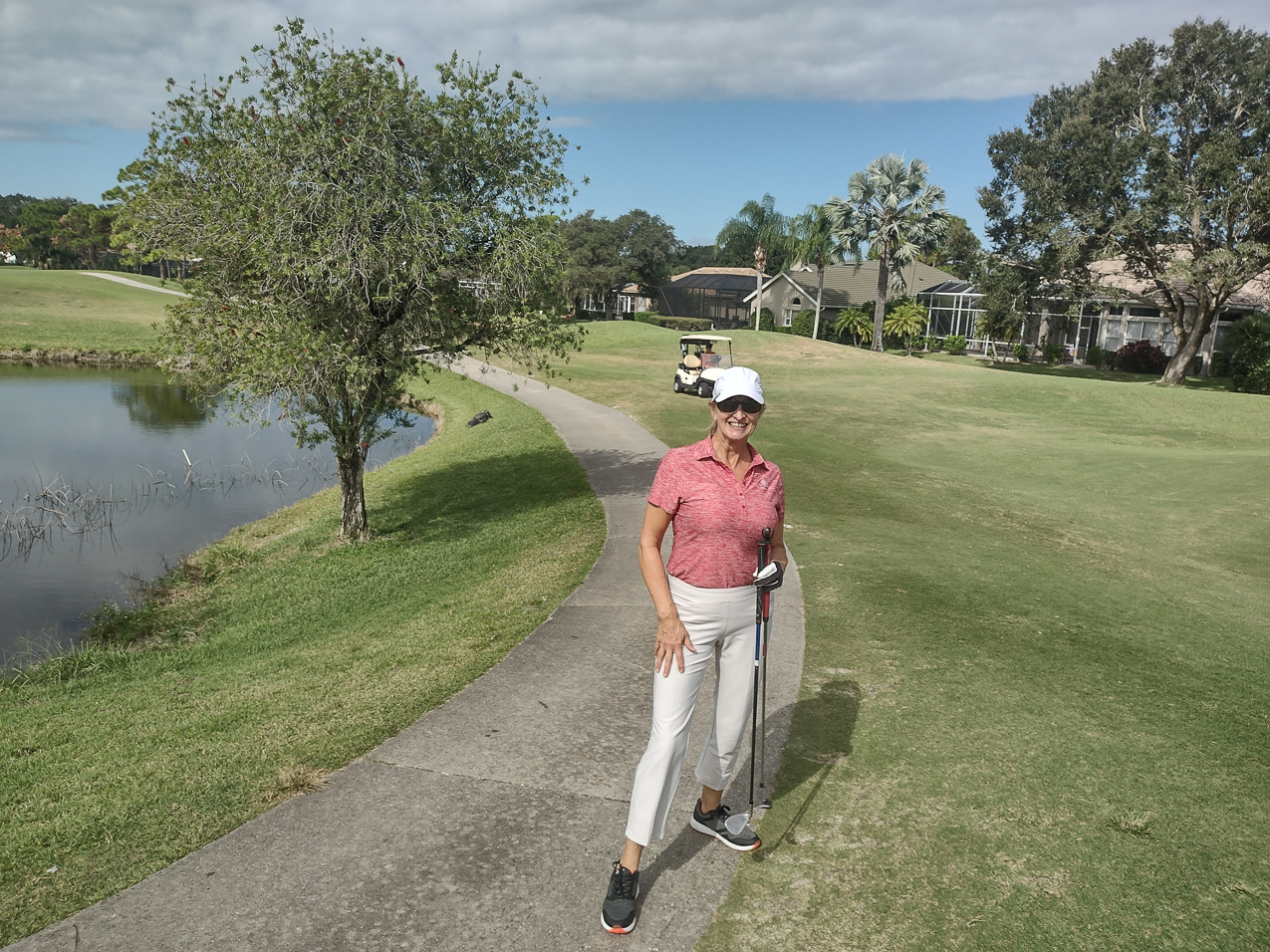 Gret on the green and a gator on the cart path  ~~  