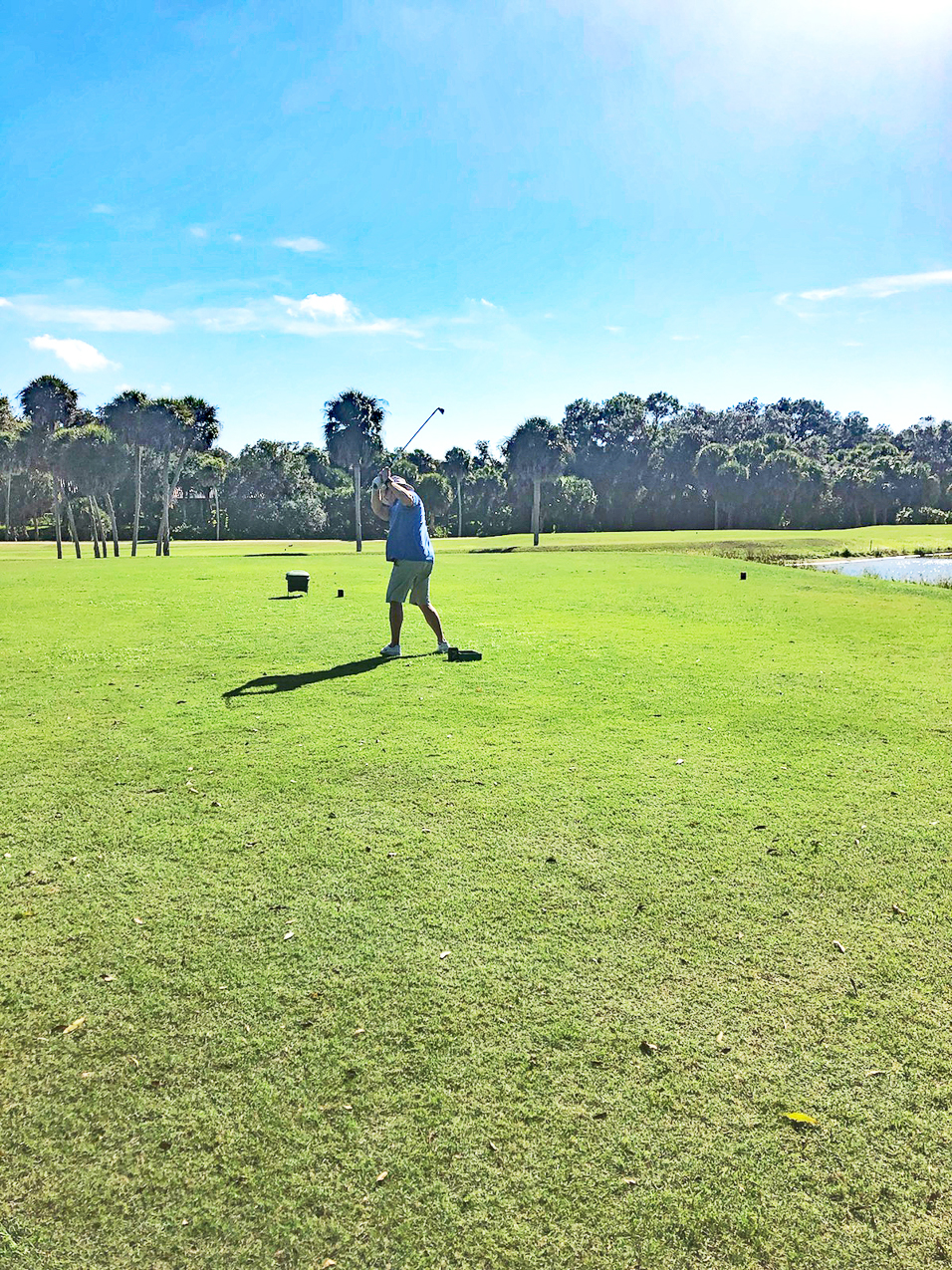 TJL taking a swat at the round ball.  ~~  I am left handed that's a backswing