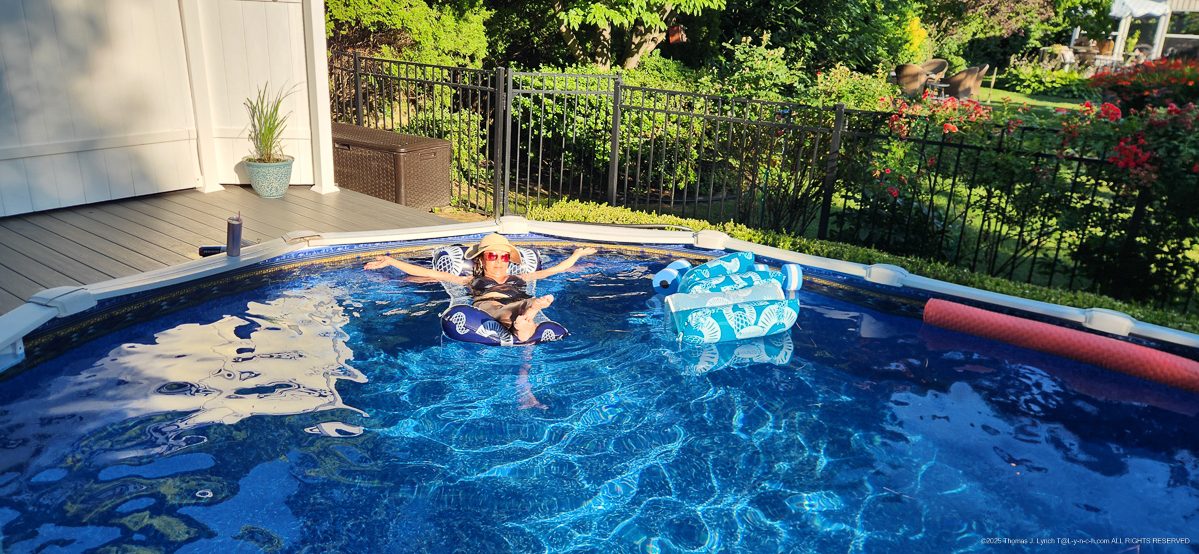 Michelle lounging in the pool