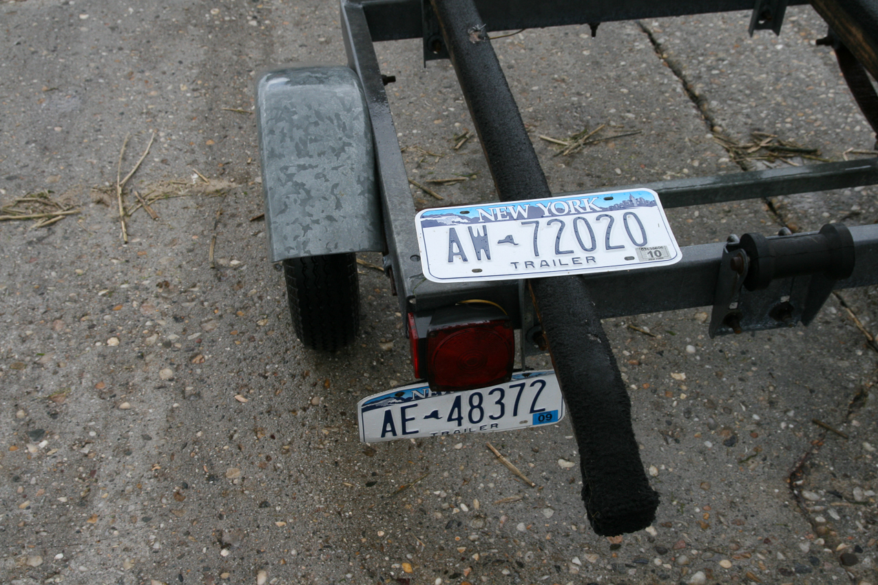 Trailer fiasco  ~~  could not get the old plate off, got ticketed for $100 for the $13.60 reg fee?