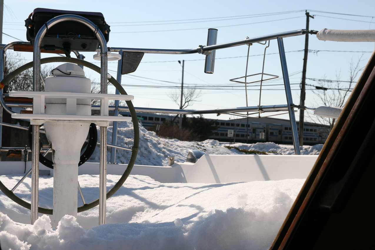 LIRR Train in the background end of the line in Port Jeff.  ~~  