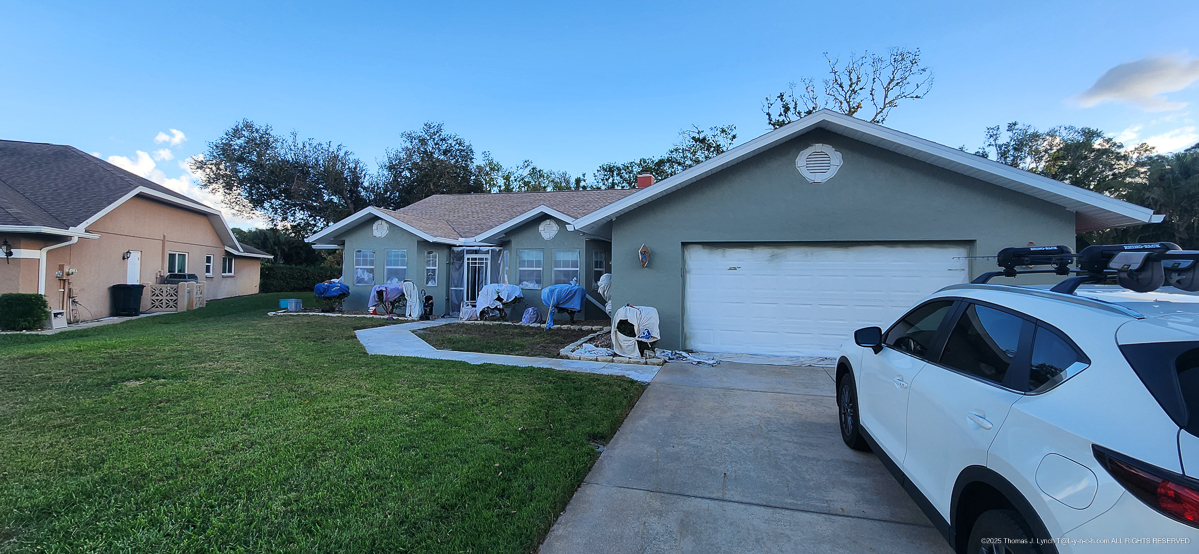 worx of Faith - Josh painting the shack