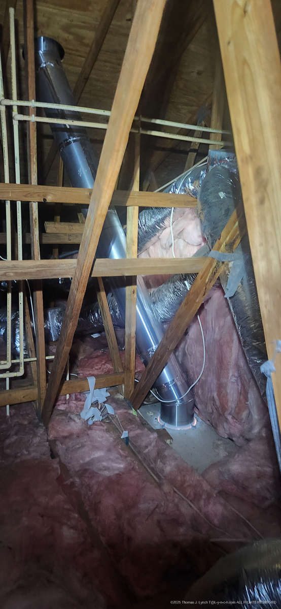 up in the attic putting in the heat lamp vent for Mary Jan 2025